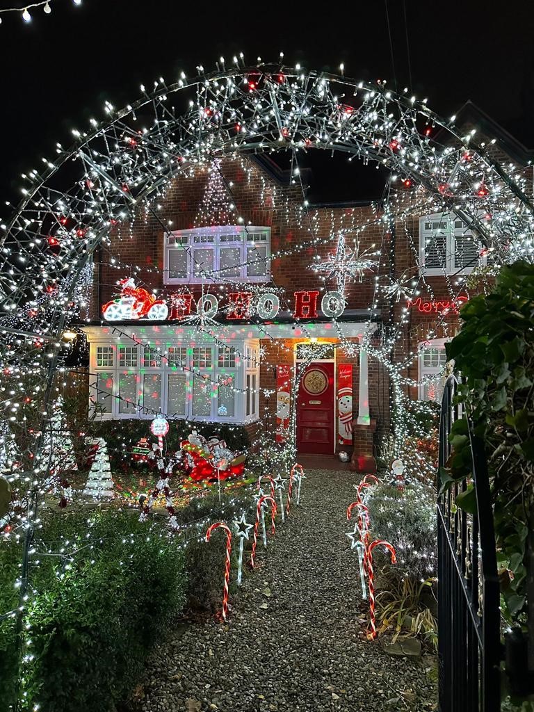 A house decorated for Christmas with lights