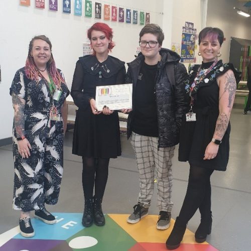 Young people and team members from The HIve with the Navajo Chartermark Certificate